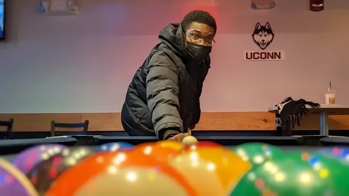 Portrait at a pool table